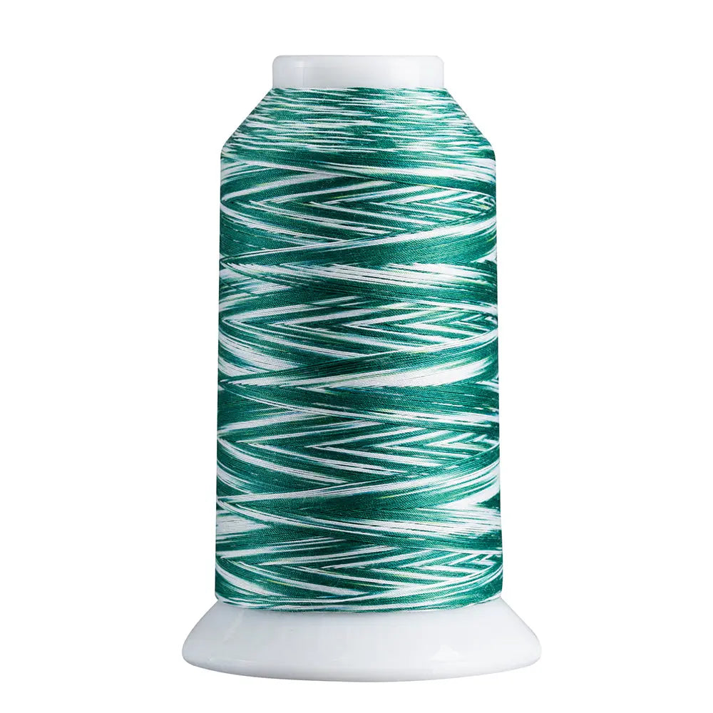 Green & White quilting and decorative stitching thread. Superior Spirit is a variegated, lint-free, matte-finish, smooth 40-wt. 3 filament polyester thread. Choose color options to match school or team colors and stitch a quilt for your favorite athlete or fan. Perfect for T-shirt quilts or embroideries. Pair with So Fine! as a bobbin thread for perfect stitches.