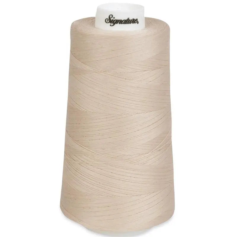 028 Ivory Signature Cotton Thread - Linda's Electric Quilters